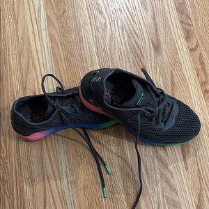 Under Armour Black and Pink Athletic Shoes with Breathable Mesh.